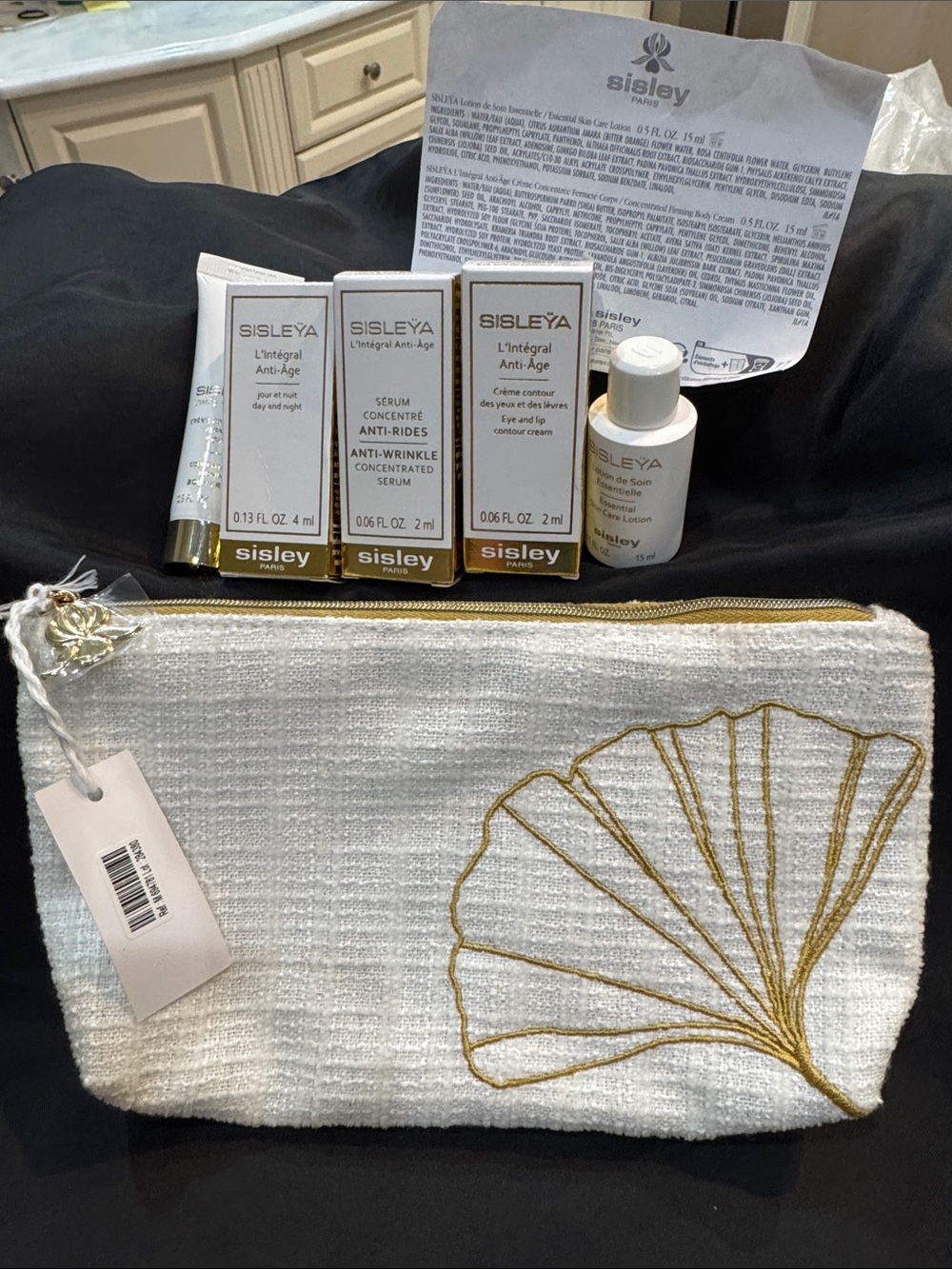 Sisley Skincare Sample Set with White and Gold Embroidered Pouch